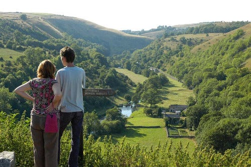 Walkers looking out over the landscape